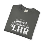 Shared slumbers in LHR airport, London, UK tee