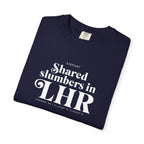 Shared slumbers in LHR airport, London, UK tee